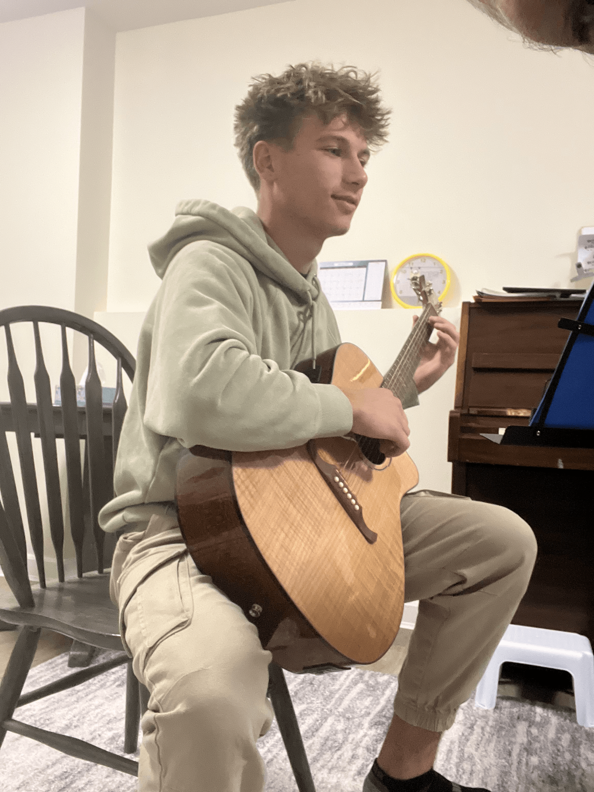 Guitar lesson in progress